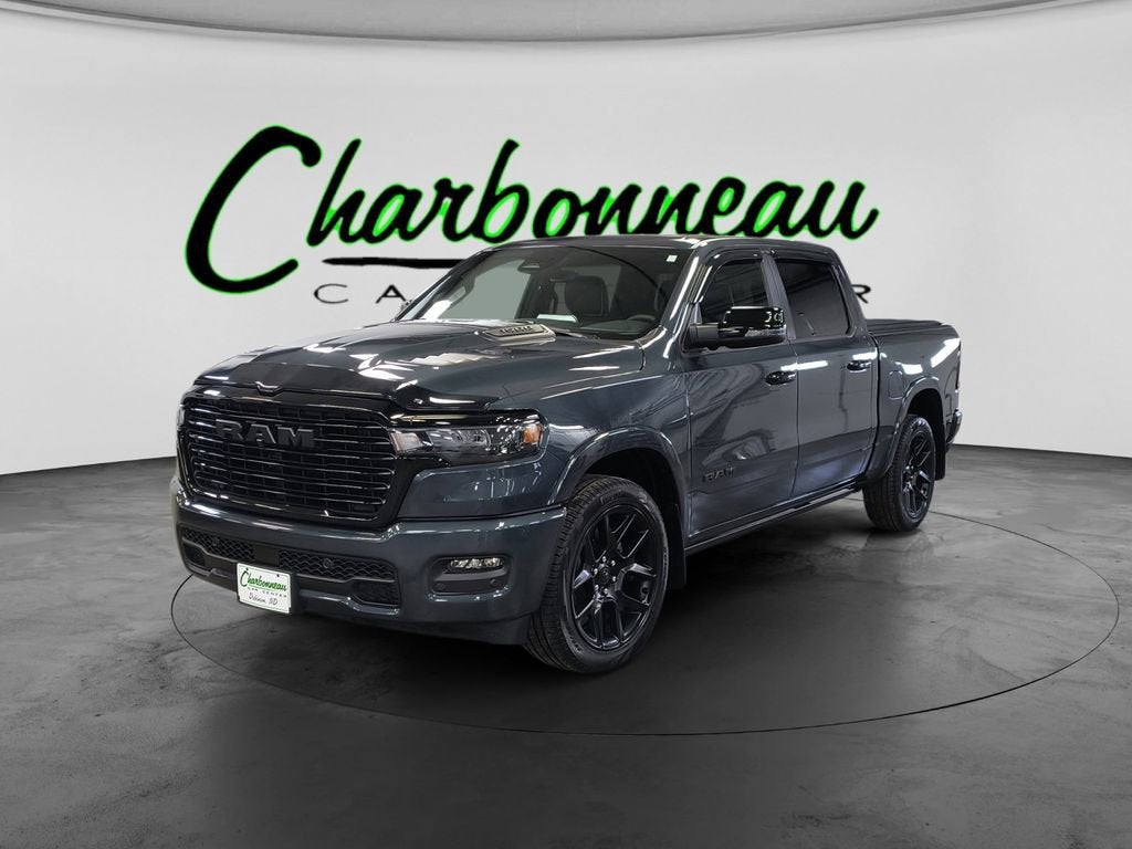 2026 RAM 1500 Laramie in Blue — front three-quarter view