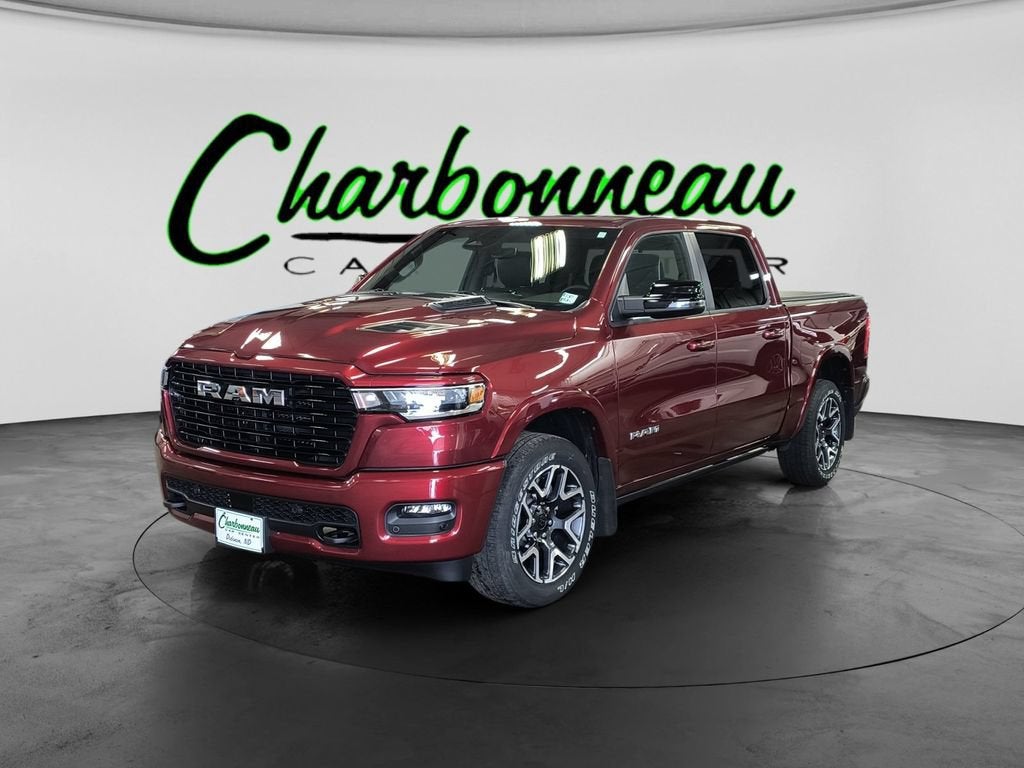 2025 RAM 1500 Laramie in Red — front three-quarter view