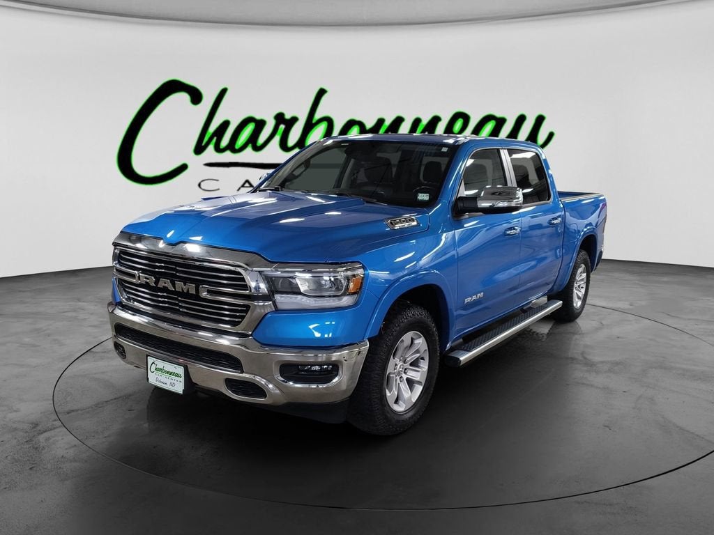 2022 RAM 1500 Laramie in Blue — front three-quarter view