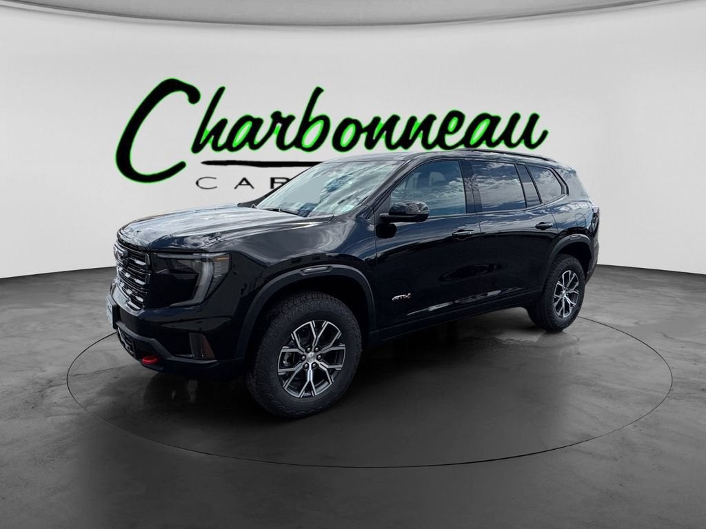 2026 GMC Acadia AT4 in Ebony Twilight Metallic — front three-quarter view