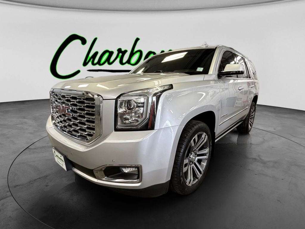 2019 GMC Yukon Denali in Quicksilver Metallic — front three-quarter view