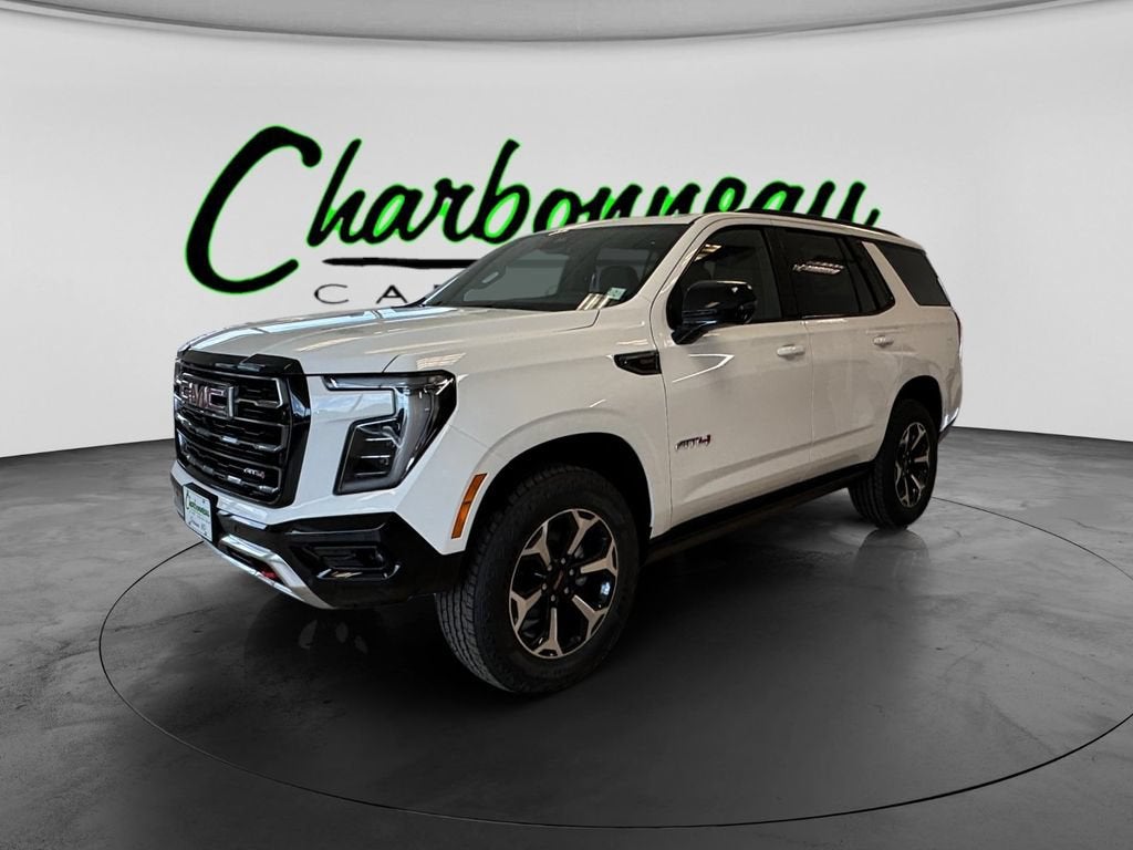 2026 GMC Yukon AT4 in Summit White — front three-quarter view