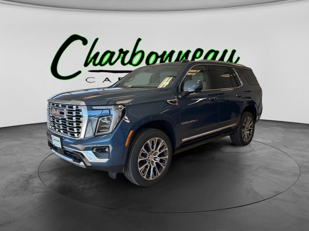 2026 GMC Yukon Denali in Downpour Metallic — front three-quarter view