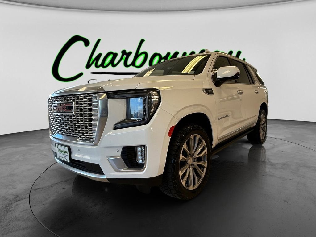 2021 GMC Yukon Denali in Summit White — front three-quarter view