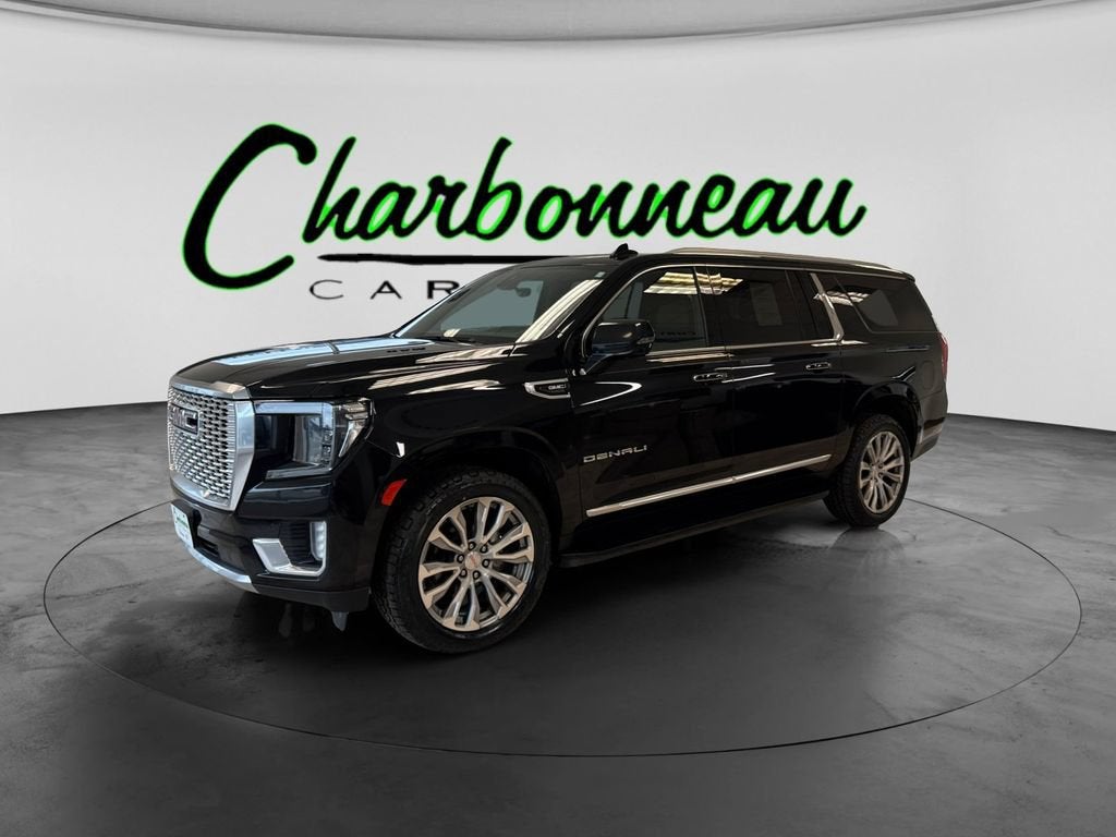 2021 GMC Yukon XL Denali in Onyx Black — front three-quarter view