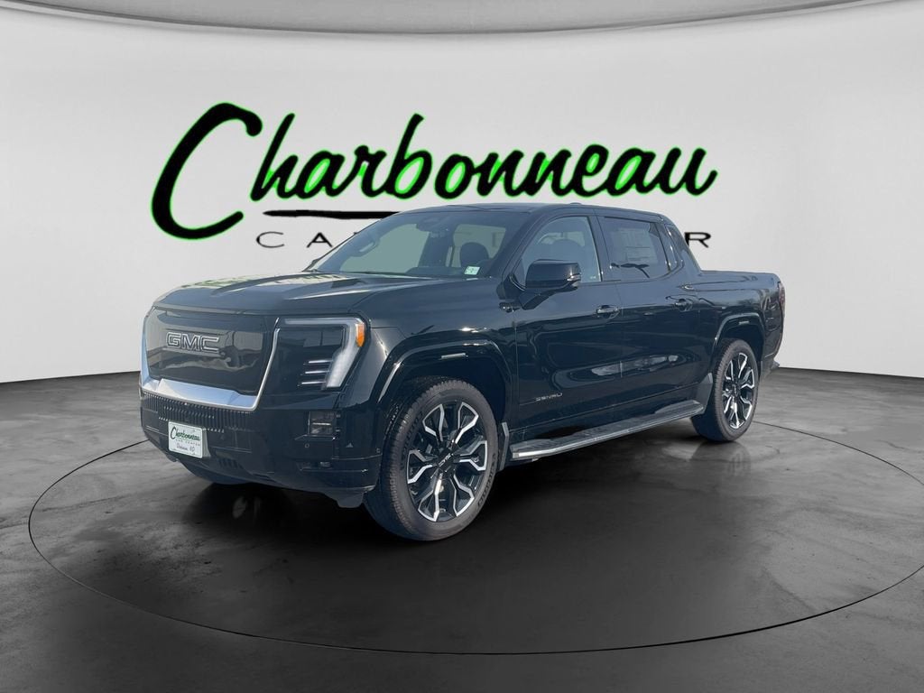 2025 GMC Sierra EV Max Range Denali in Onyx Black — front three-quarter view