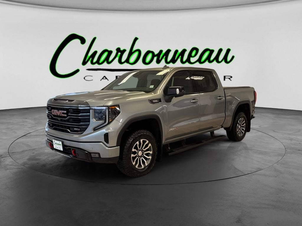 2023 GMC Sierra 1500 AT4 in Sterling Metallic — front three-quarter view