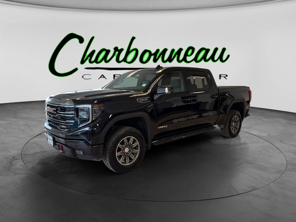 2024 GMC Sierra 1500 AT4 in Onyx Black — front three-quarter view