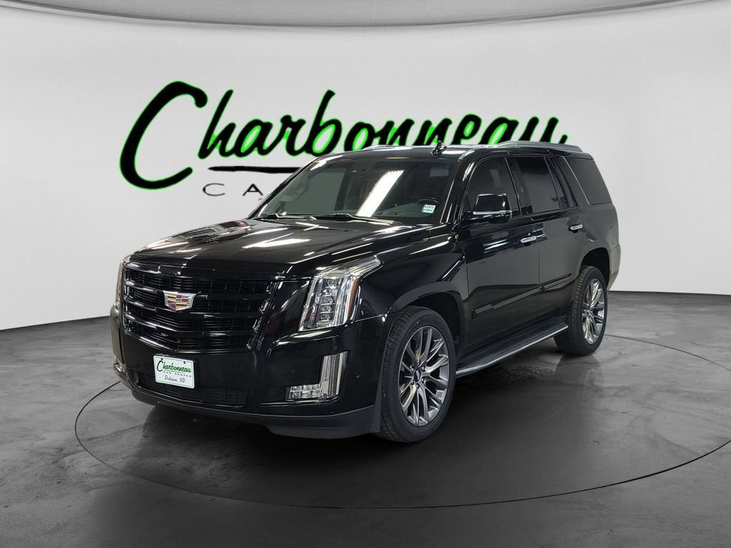 2019 Cadillac Escalade Luxury in Black Raven — front three-quarter view