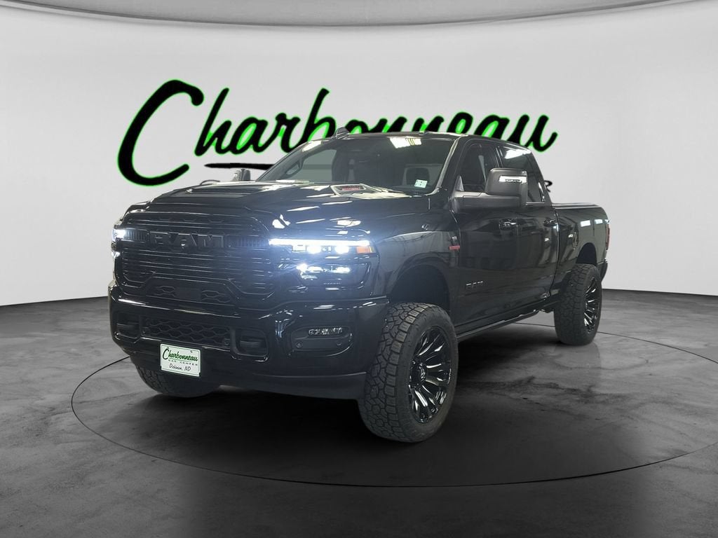 2026 RAM 2500 Laramie in Black — front three-quarter view