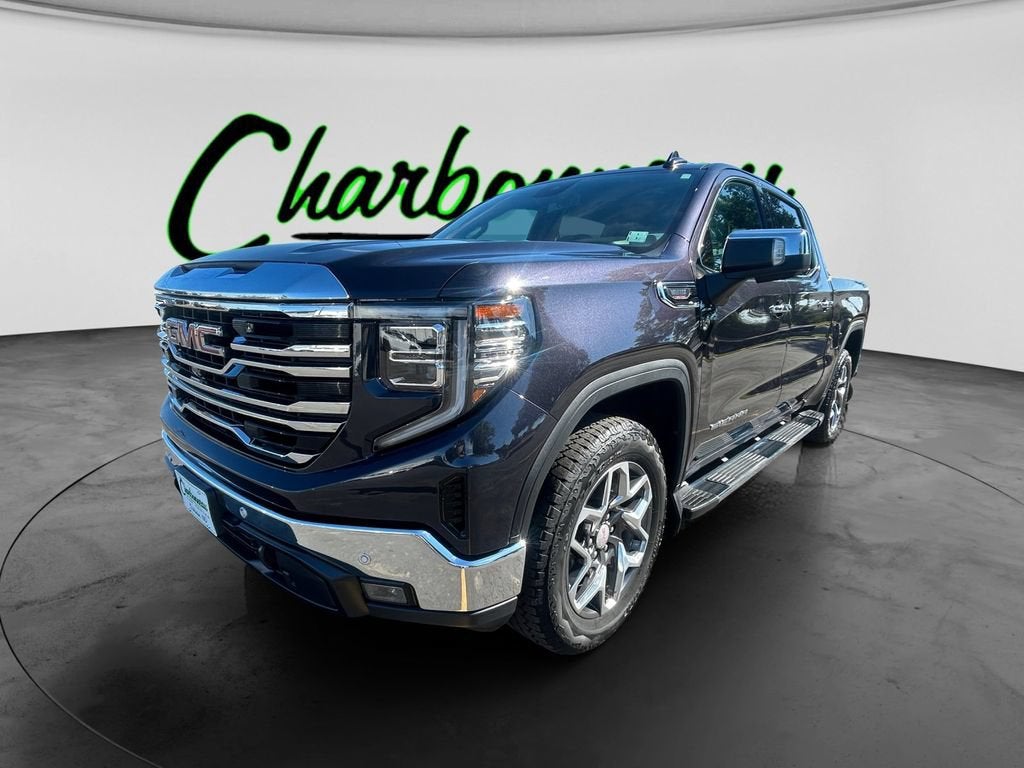 2024 GMC Sierra 1500 SLT in Titanium Rush Metallic — front three-quarter view