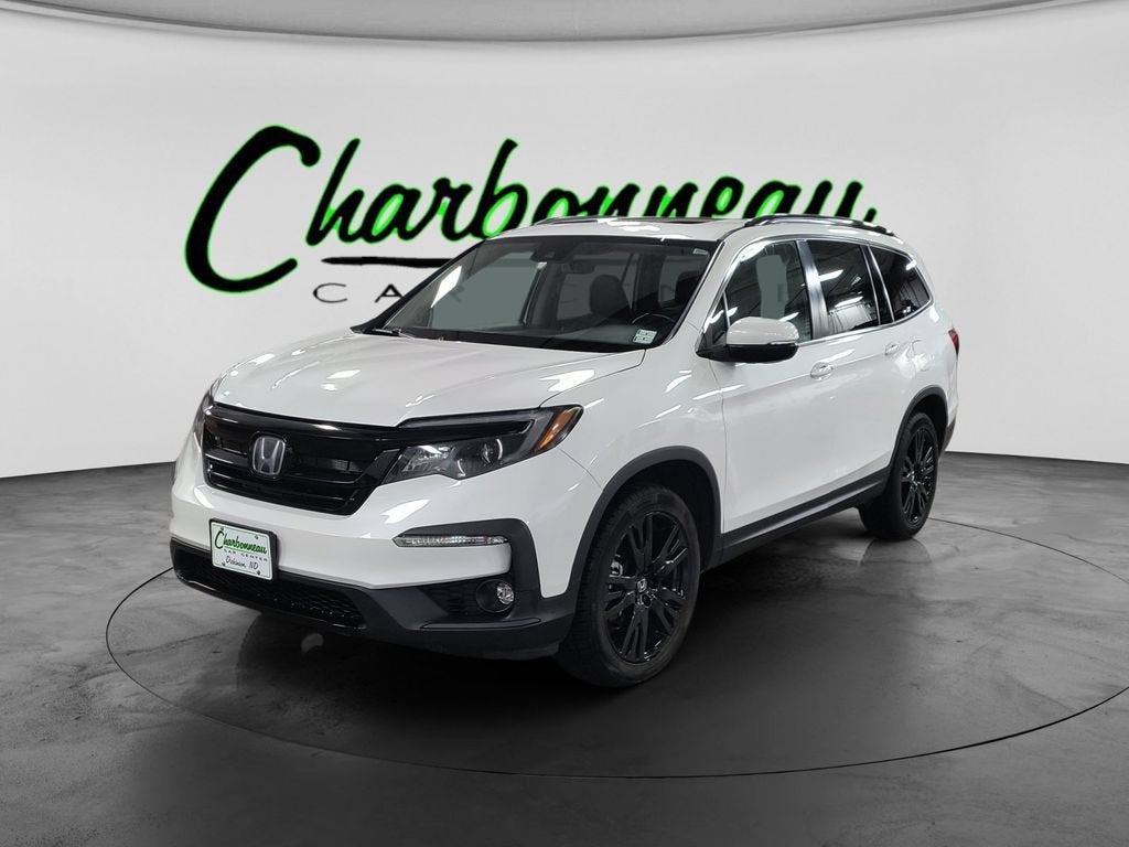 2021 Honda Pilot Special Edition in White — front three-quarter view