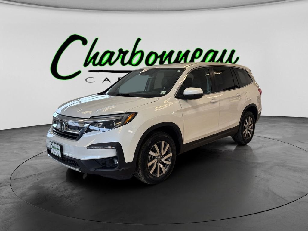 2020 Honda Pilot EX-L in White — front three-quarter view